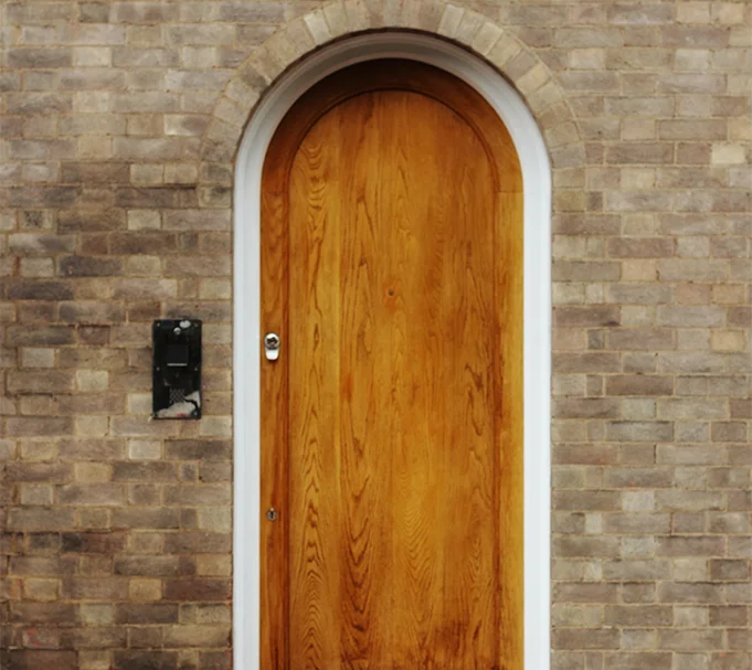 The kickplatedirect.com image of a wood door with a kickplate